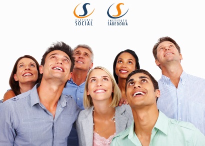 Group of multi racial business people looking up at copyspace